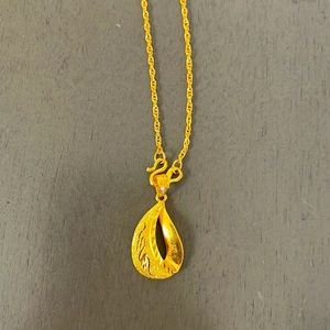 24 karat gold Chinese necklace with 24 karat gold 18 inch chain.
